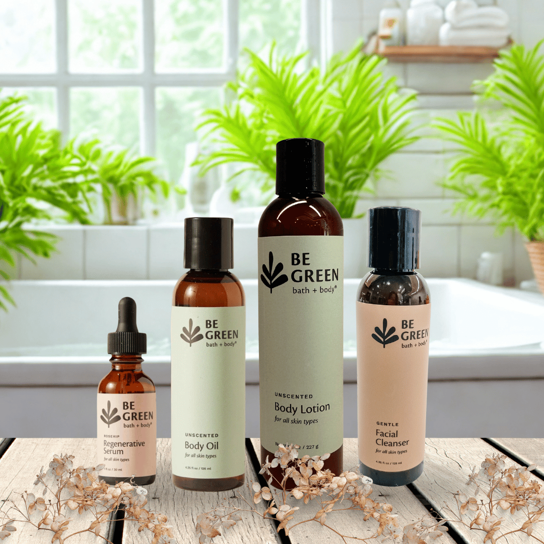 Collection of Best Selling EWG Verified 'Be Green' bath and body products on a wooden surface with plants in the background.