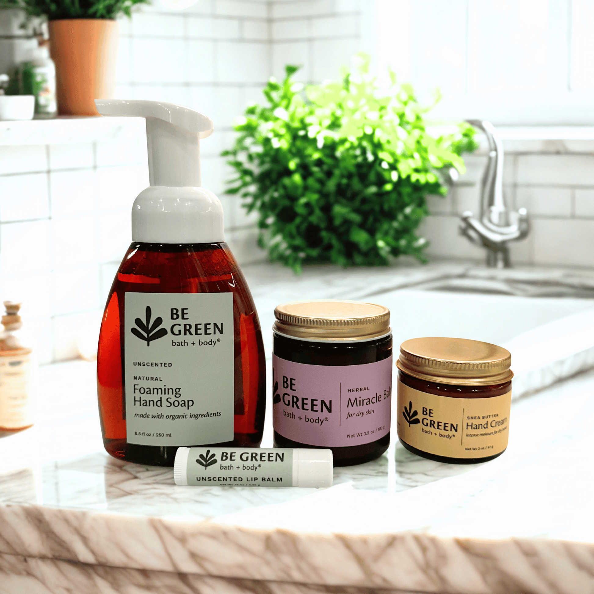 Be Green bath & body products on a kitchen counter with plants in the background