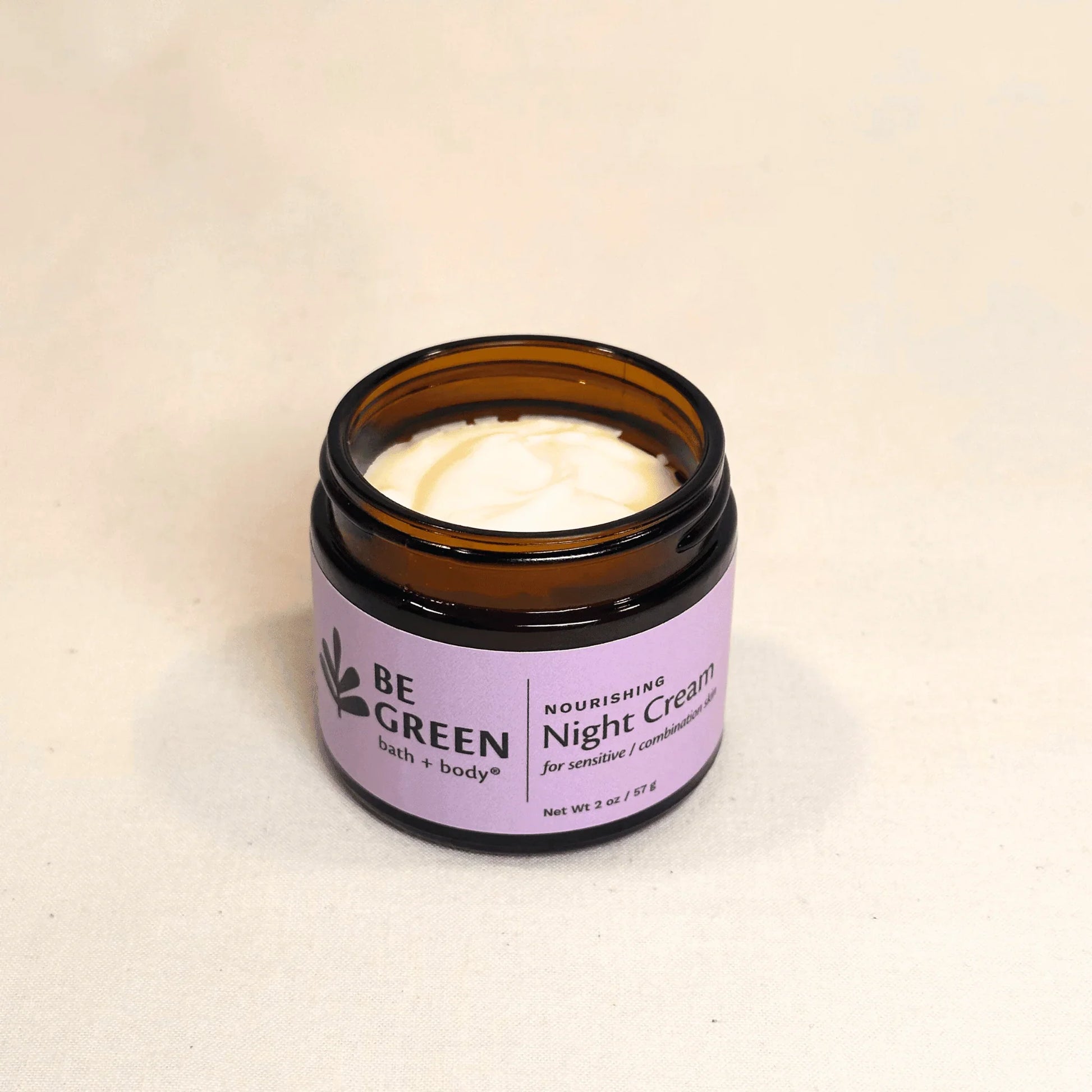 Natural night cream for sensitive skin open amber glass jar
