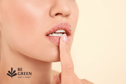 A woman applying a DIY lip scrub to dry lips