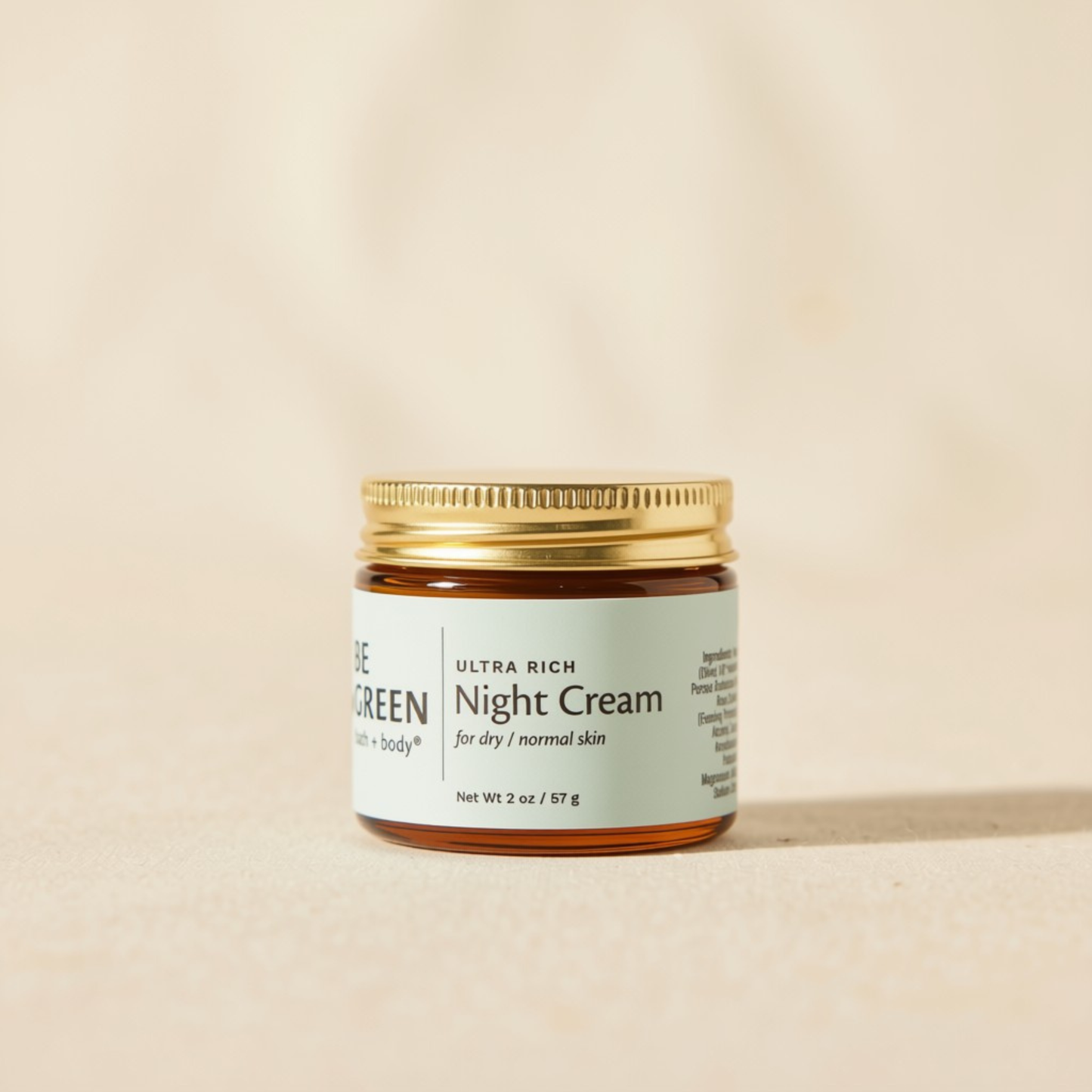 Jar of Night Cream for Dry Skin on a light tan background.