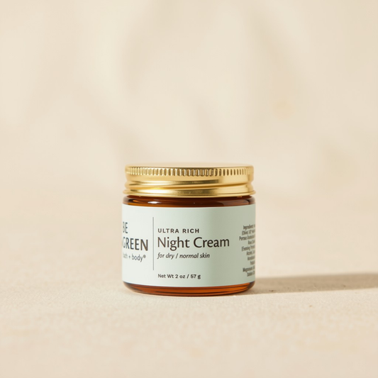 Jar of Night Cream for Dry Skin on a light tan background.
