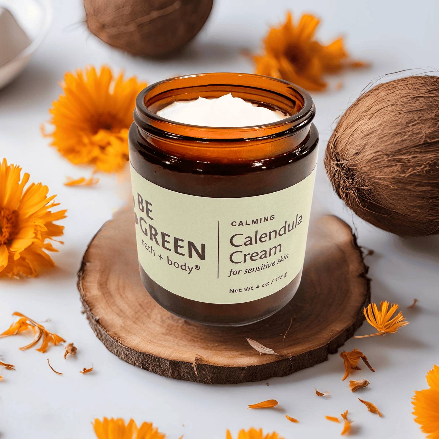 Open jar of EWG Verified natural calendula cream for eczema