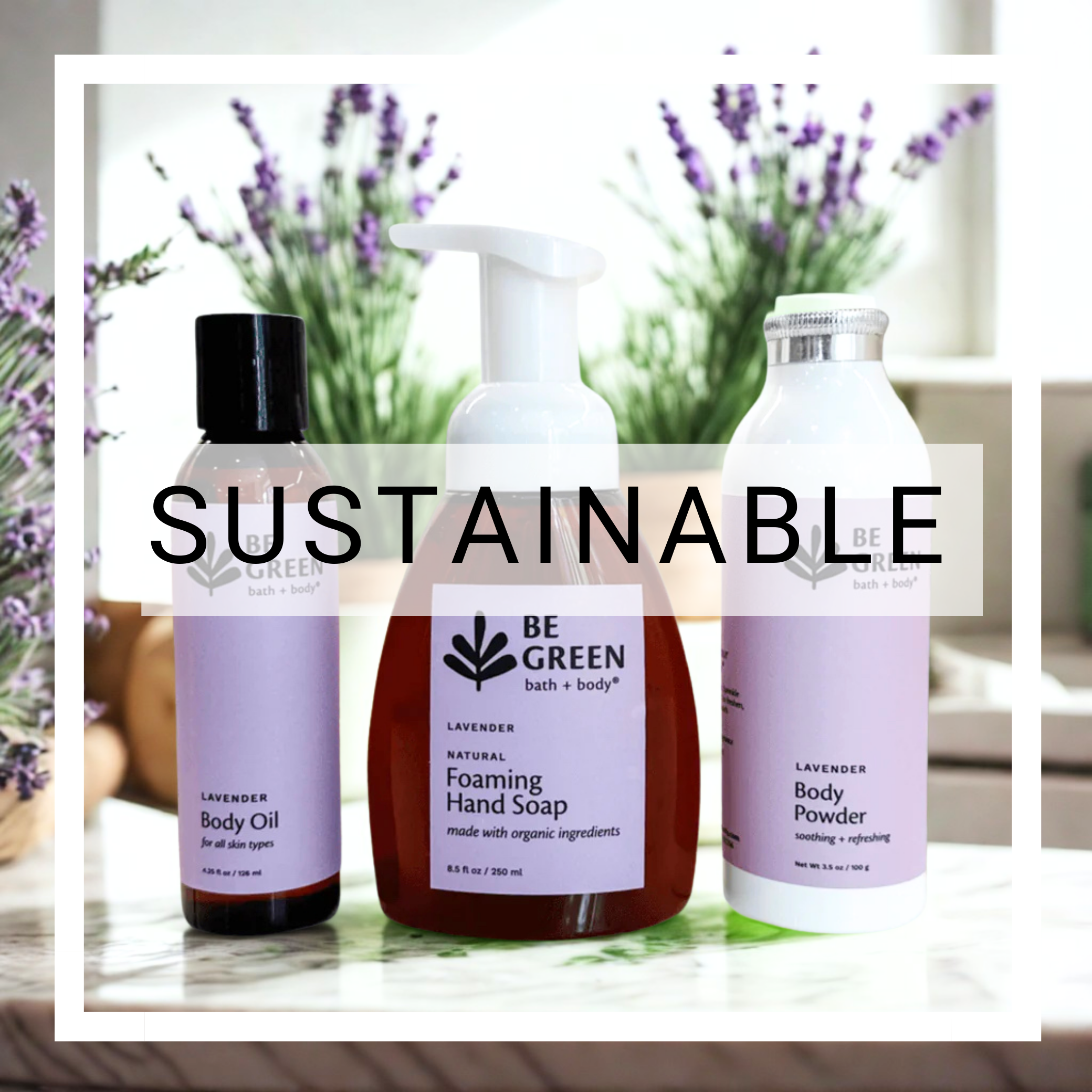 Three bottles of 'Be Green' bath and body products with lavender flowers in the background.
