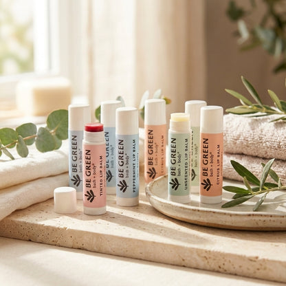 Set of 10 natural lip balms
on a stone with towels and greenery