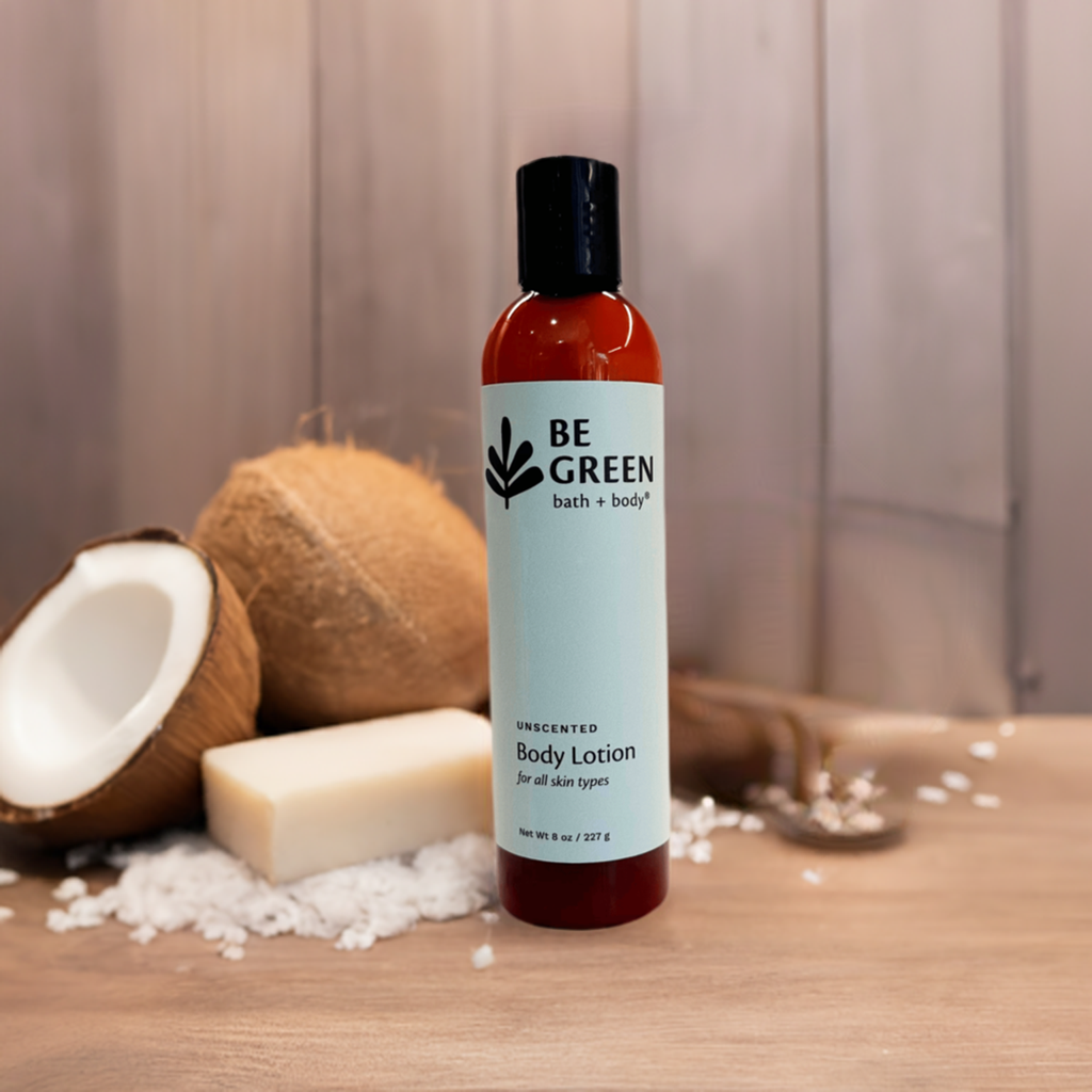 Organic unscented body lotion on a table with coconuts