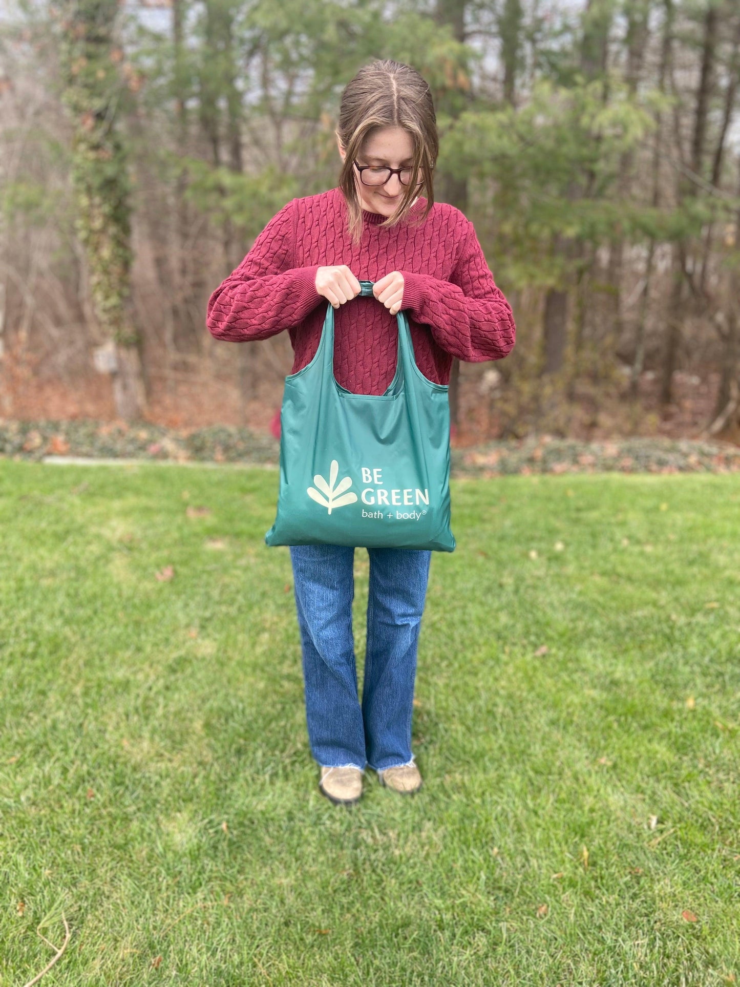 Be Green reusable tote bag.  Model shows size.